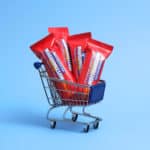 Barebells Rocky Road lifestyle image three bars in cart